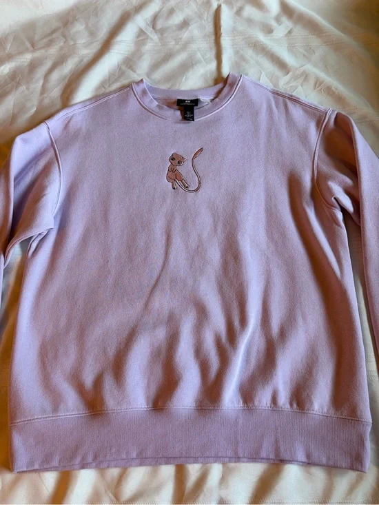 Pokémon Mew H&M Lavender Crewneck Sweater with Embroidered Cat Motif