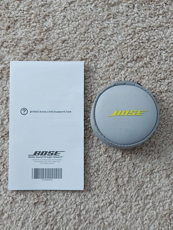 Bose Light Gray Round Earbud Case with Yellow Logo