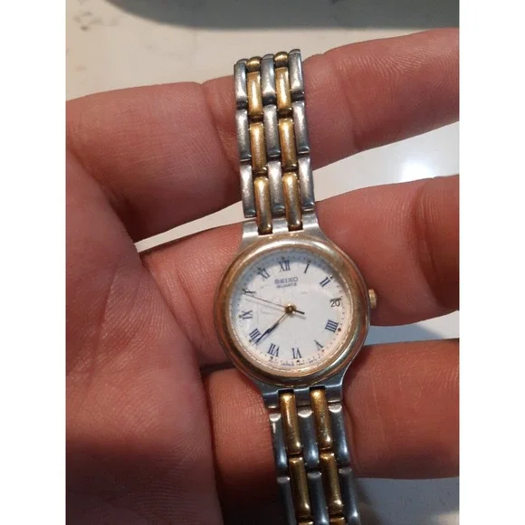 Seiko Watch Women 24mm White Dial Two Tone Date Round 7N82-6B29