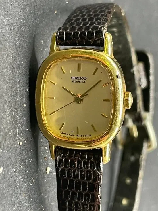 Vintage Seiko Watch Women's Champagne Dial Gold Tone Oval 4N01-5819 Brown Band