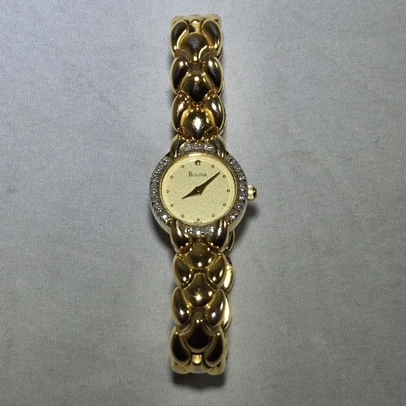 Bulova Women 98R18 Luxury Diamond Bezel Gold Tone Quartz Watch 5.5