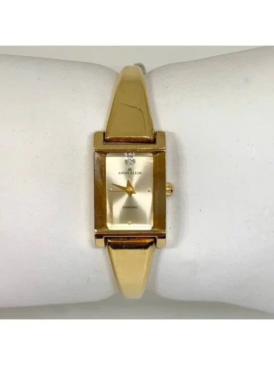Anne Klein Diamond gold tone women watch 16mm rectangular quartz 6.5” running