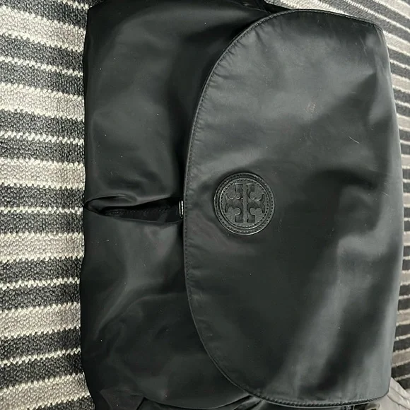 Tory Burch diaper bag. Gently used. black. Includes changing pad.