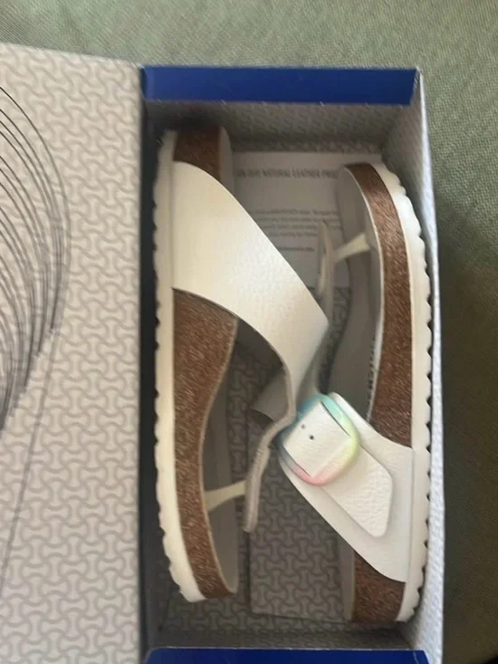 White Birkenstock Gizeh with rainbow big buckle