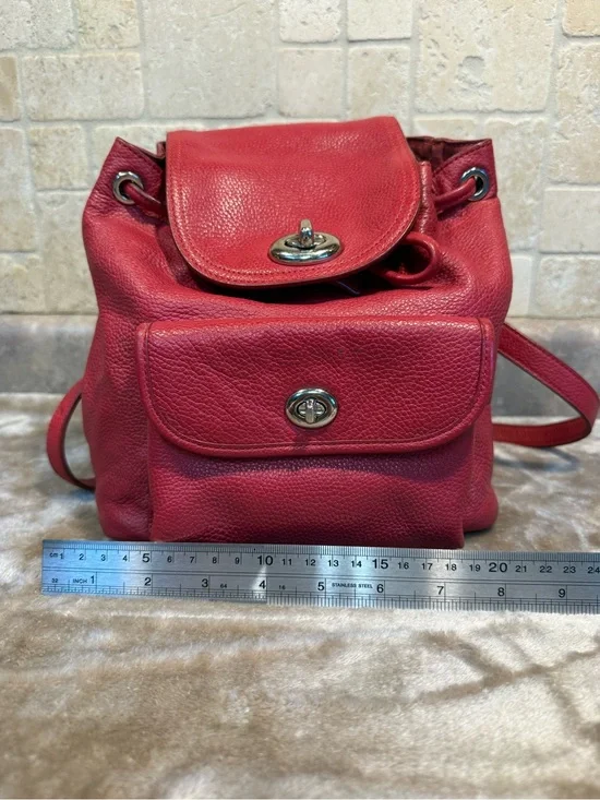 Coach Mini Red Pebble Leather Drawstring Backpack with Front Pocket