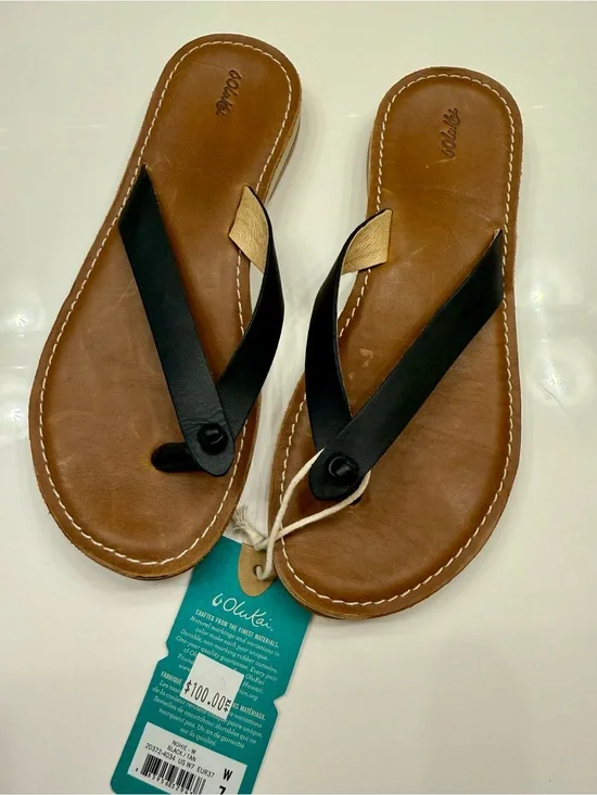 OluKai Women's Tan Leather Flip Flops with Black Straps