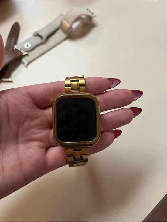 Apple silver stainless steel smartwatch with link band and case