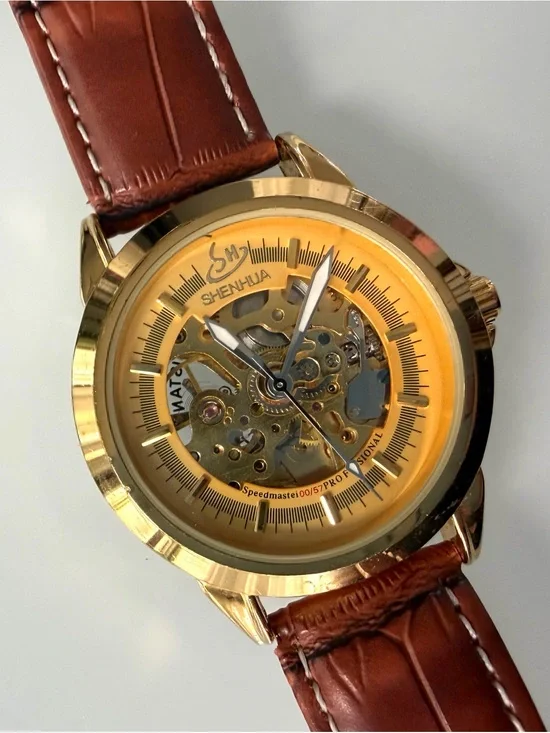 Gold Skeleton Mechanical Watch with Brown Leather Strap