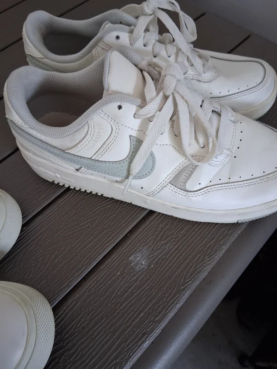 Nike White Low-Top Sneakers with Light Gray Swoosh