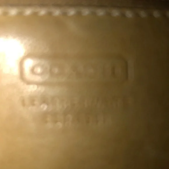 Vintage Coach tan genuine leather wristlet