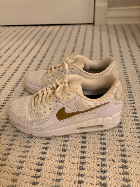 Nike Women’s Cream Sneakers with Gold Swoosh