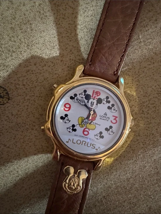Needs batteries: Disney Lorus Gold-Tone Mickey Mouse Watch with Brown Strap