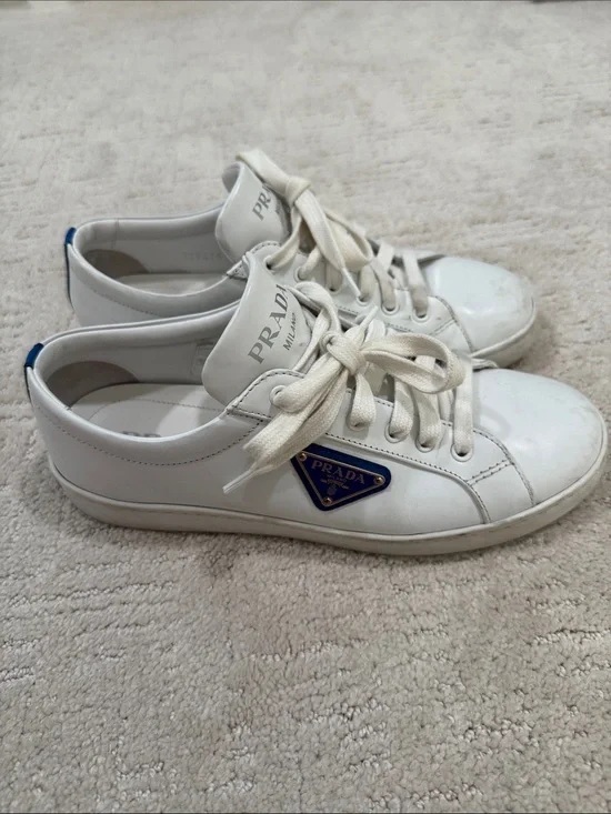 Prada White Leather Sneakers with Blue Logo Accent