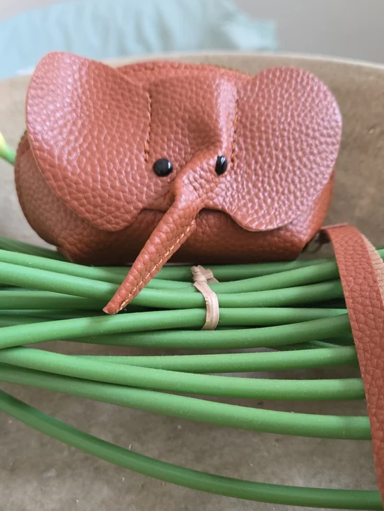 Brown Elephant wristlet/coin.purse is back in stock. Zipper closure -