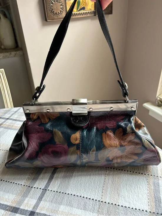 Patricia Nash Ferrara satchel purse. Dark multicolored floral leather print