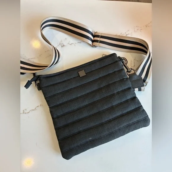 Think ROLYN black puffer crossbody bag with seatbelt strap