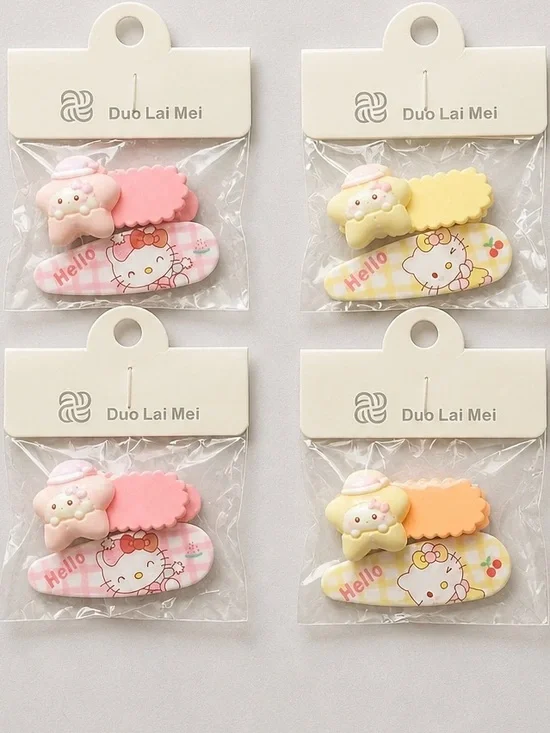NWT Set of 4 Hello Kitty Child Size Hair Clips Barretts Orange Pink & Purple