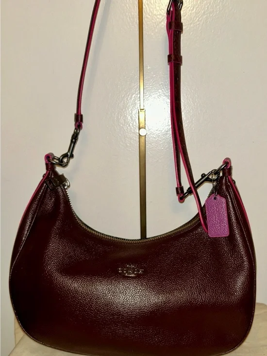 Coach Exotic Trim East/West Harley Hobo Bag the color Oxblood Multi.