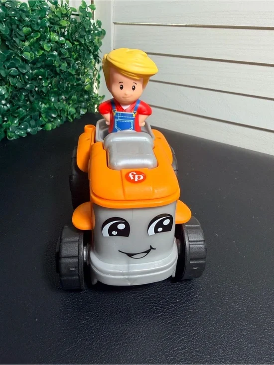 Fisher-Price Little People Smiling Push Lawn Mower with removable Blonde Driver