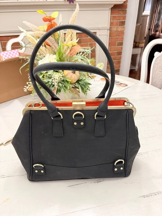 Black Satchel with Gold-Tone Hardware and Orange Interior