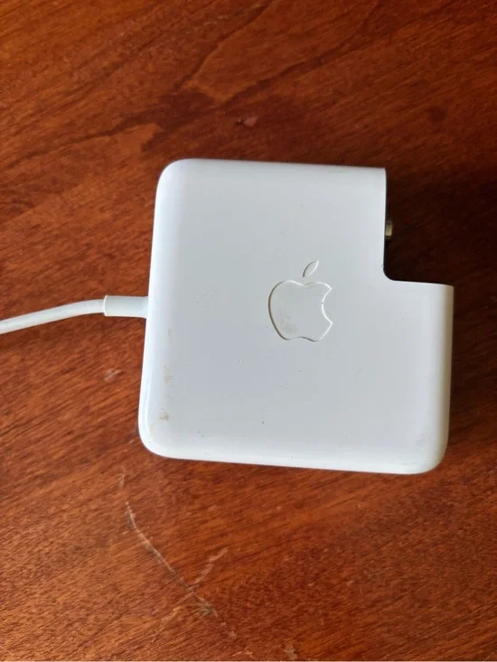 Apple MagSafe power adapter with a fold-out wall plug duckhead attachment