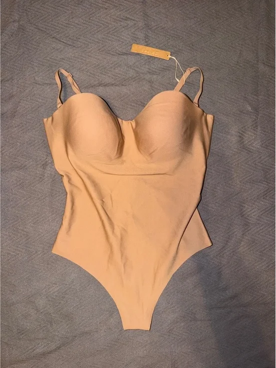 SKIMS Nude Shapewear Bodysuit with Adjustable Straps and Snap Closure