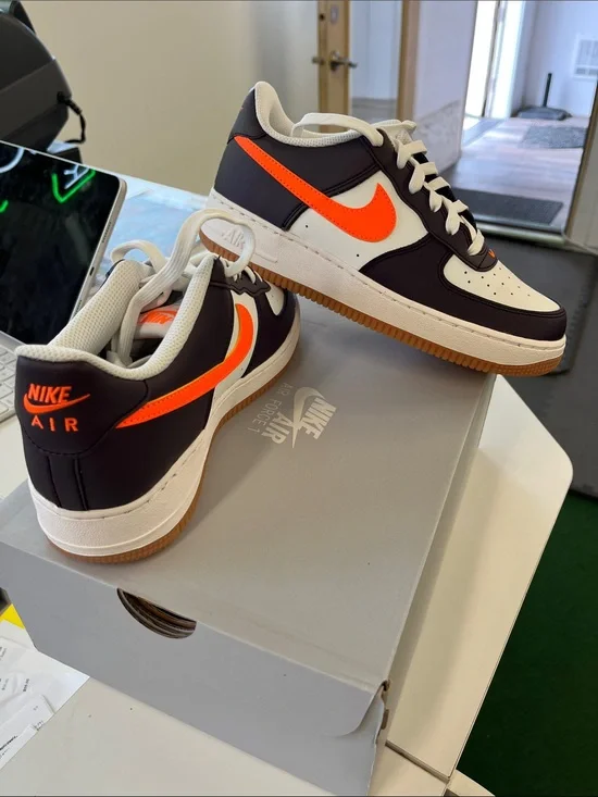 Nike Air Force 1’s Men’s Low-Top Sneakers - Black/White with Orange Swoosh