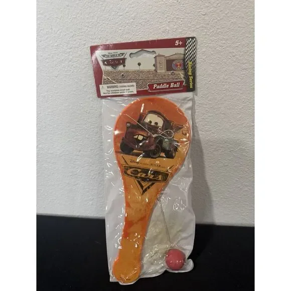 DISNEY PIXAR CARS Mater MOVIE PLASTIC PADDLE BALL RACING‎ SERIES NEW IN PACKAGE