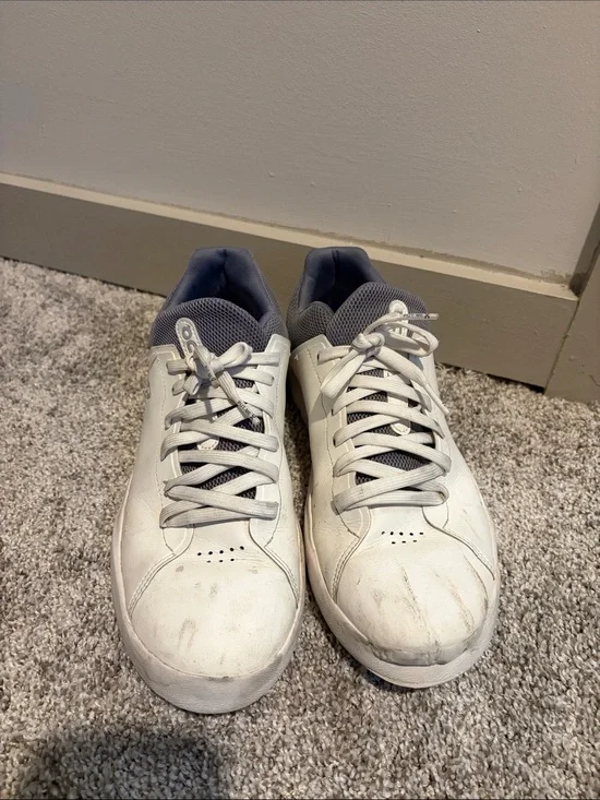 On Running “Roger” Sneaker. White and grey. Mens size 10.5. Used.