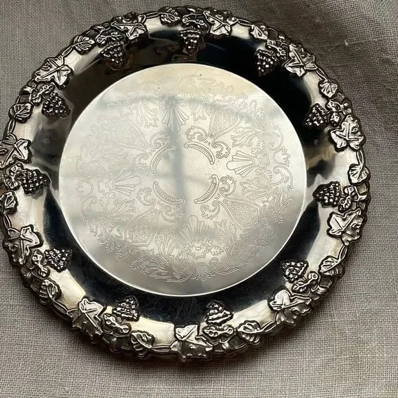 VTG Hong Kong etched grape leaves wine bottle coaster.