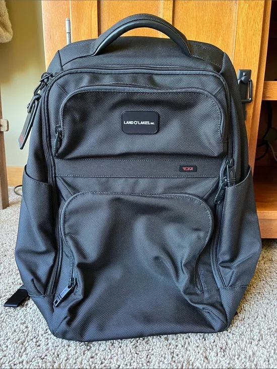 TUMI Corporate Laptop Backpack 22205DE never used. Branded with Land O’Lakes tag