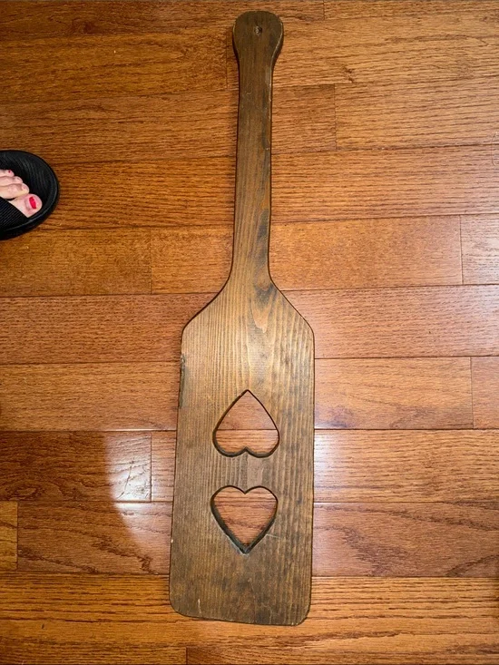 Vintage Brown Wooden Paddle with Heart Cutouts