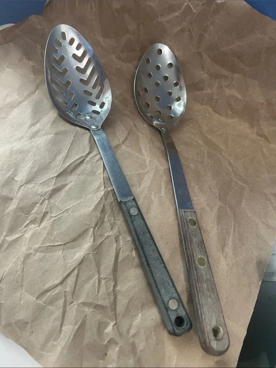 Set of Two Metal Slotted Serving Spoons with Gray and Brown Handles