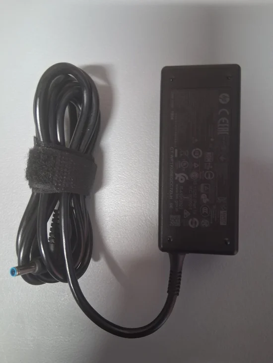HP 45W 19.5V AC Power Adapter with Blue-Tip Connector, Model No. R-41013323.