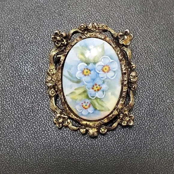 Vintage gold tone painted blue flower cameo brooch green