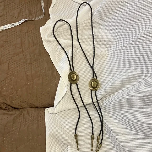 Classic Western Bolo Tie with Gold and Black Design