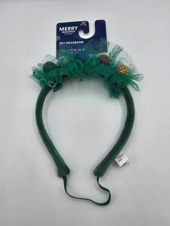 Merry Makings green pet headband adorned with tinsel and small ornaments