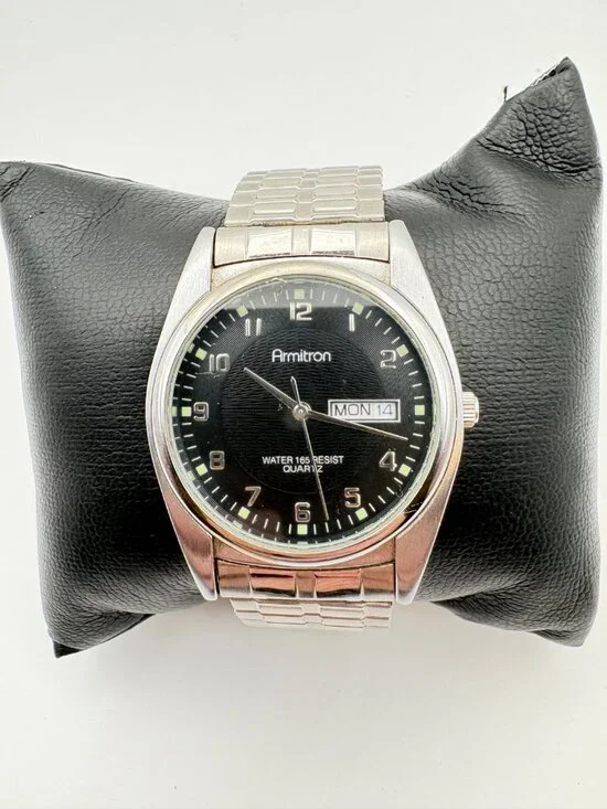 Armitron Mens Watch 20/1143SV Black Textured Dial Day Date Expansion Band 35mm