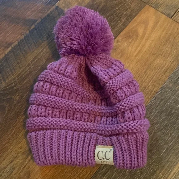 C.C kids purple beanie with poof ball
