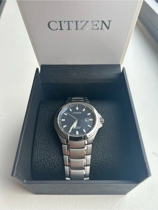 Citizen Paradigm Super Titanium Watch with Blue Dial & Stainless Bracelet
