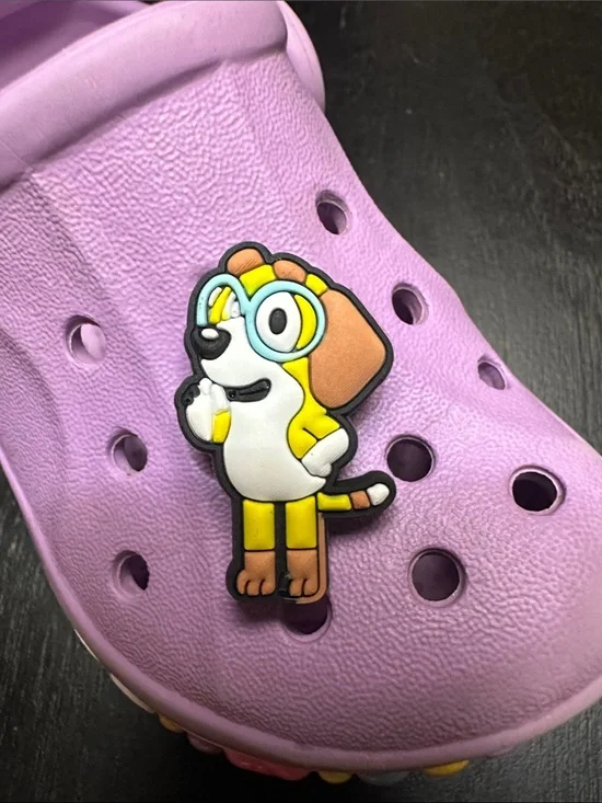 Bluey character shoe charms. Honey I believe.