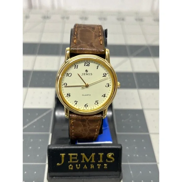 Vtg Jemis‎ Quartz Watch Gold Brown Leather Strap Cream Dial Needs Battery NOS