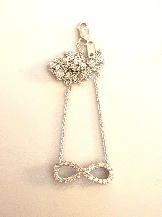 Vintage Zales 1/10 CT. T.W. Diamond Sterling Sideways Infinity Necklace