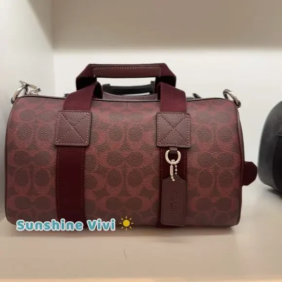 NWT Coach Explorer Duffle Bag 28 Signature Canvas CET22 SV/Black Currant