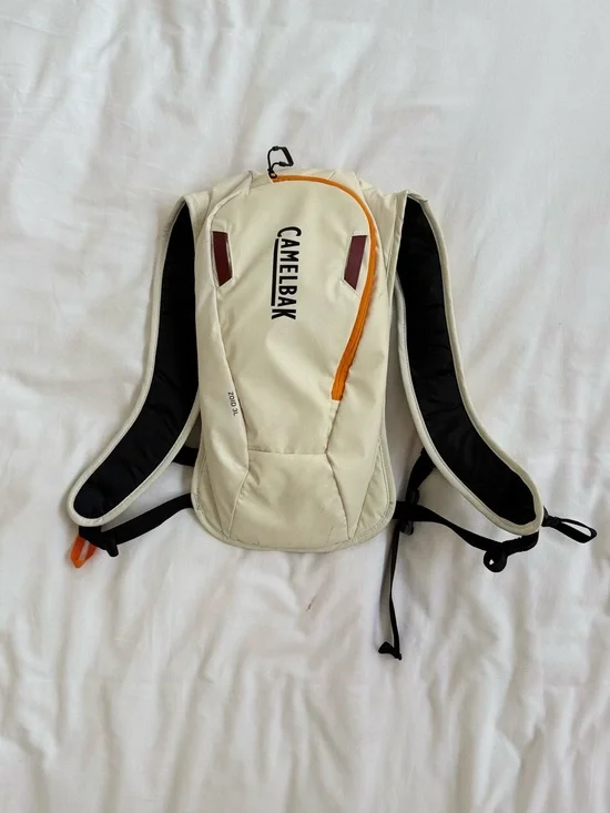 CamelBak Cream Hydration Backpack with Orange Detail