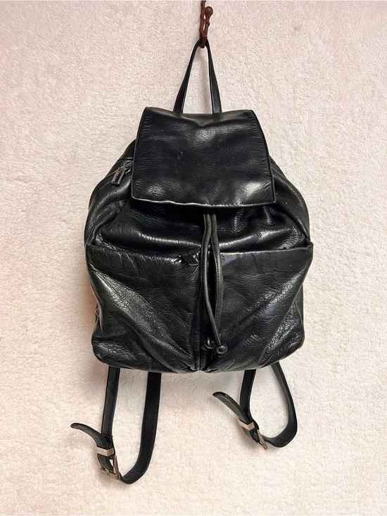 Perlina Black Leather Drawstring Flap Backpack