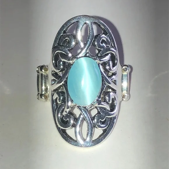Silver Tone Filigree Ring with Aqua Blue Moon Glow Faux Stone
