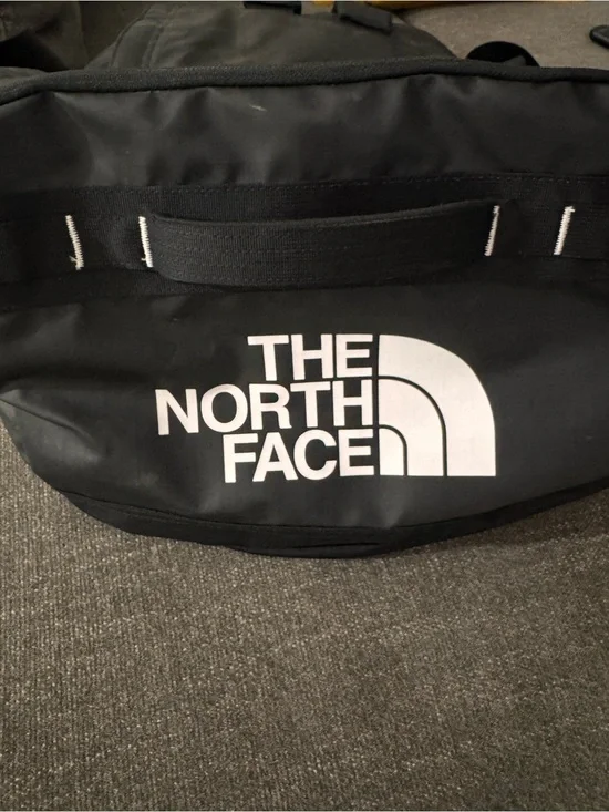 The North Face Black Duffel Bag with White Logo