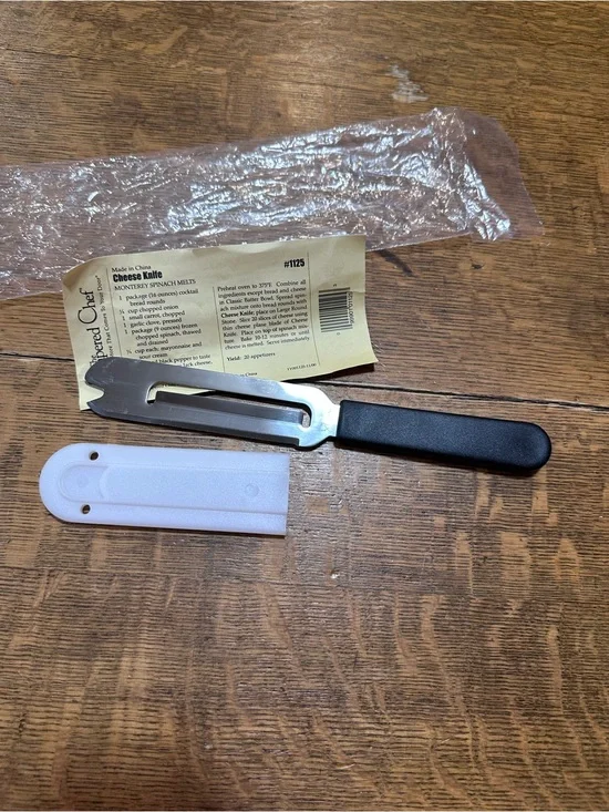 The Pampered Chef NEW Black Handled Cheese Knife with White Sheath