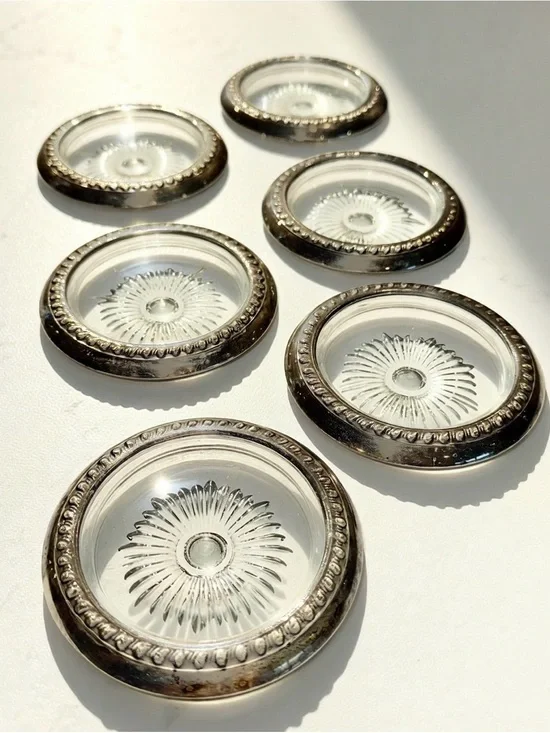 6 Sterling silver rimmed coasters